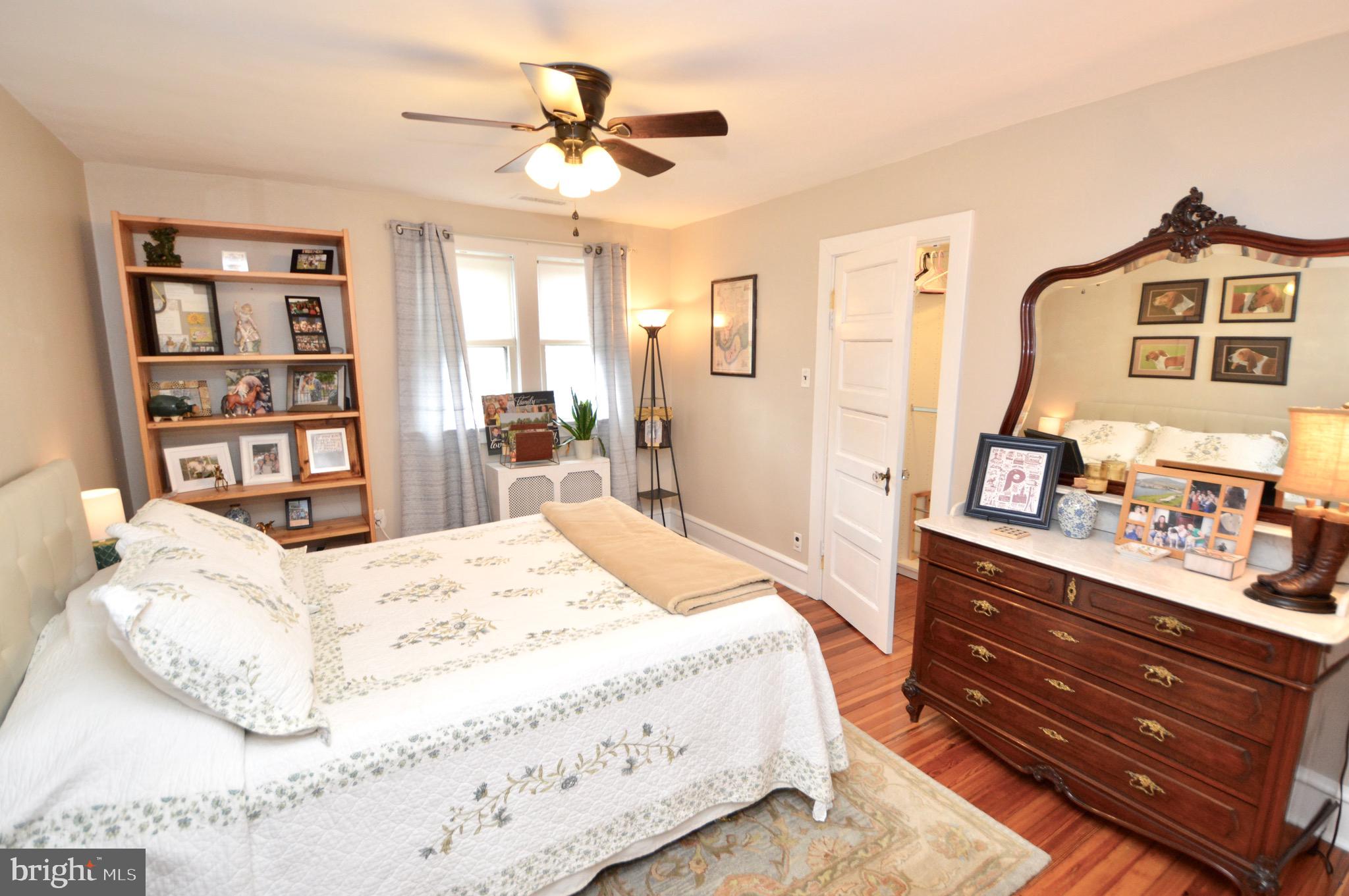 18 10th Avenue Haddon Heights, NJ 08035 - Photo 11 of 22 a bedroom with a bed dresser and a window