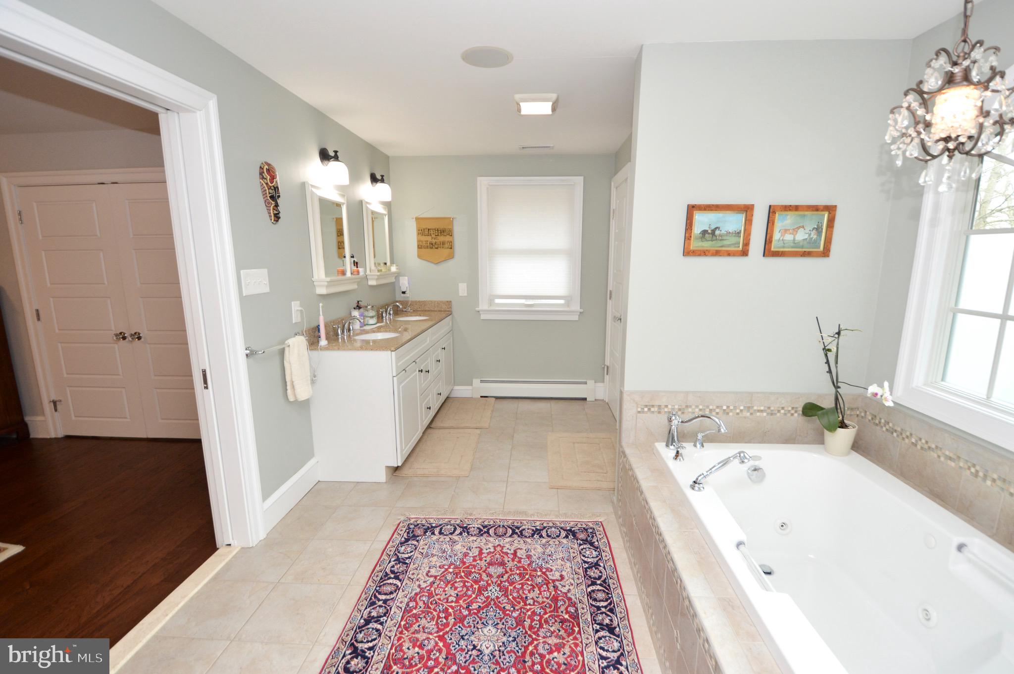 18 10th Avenue Haddon Heights, NJ 08035 - Photo 18 of 22 a large spacious bathroom with a tub sink and mirror