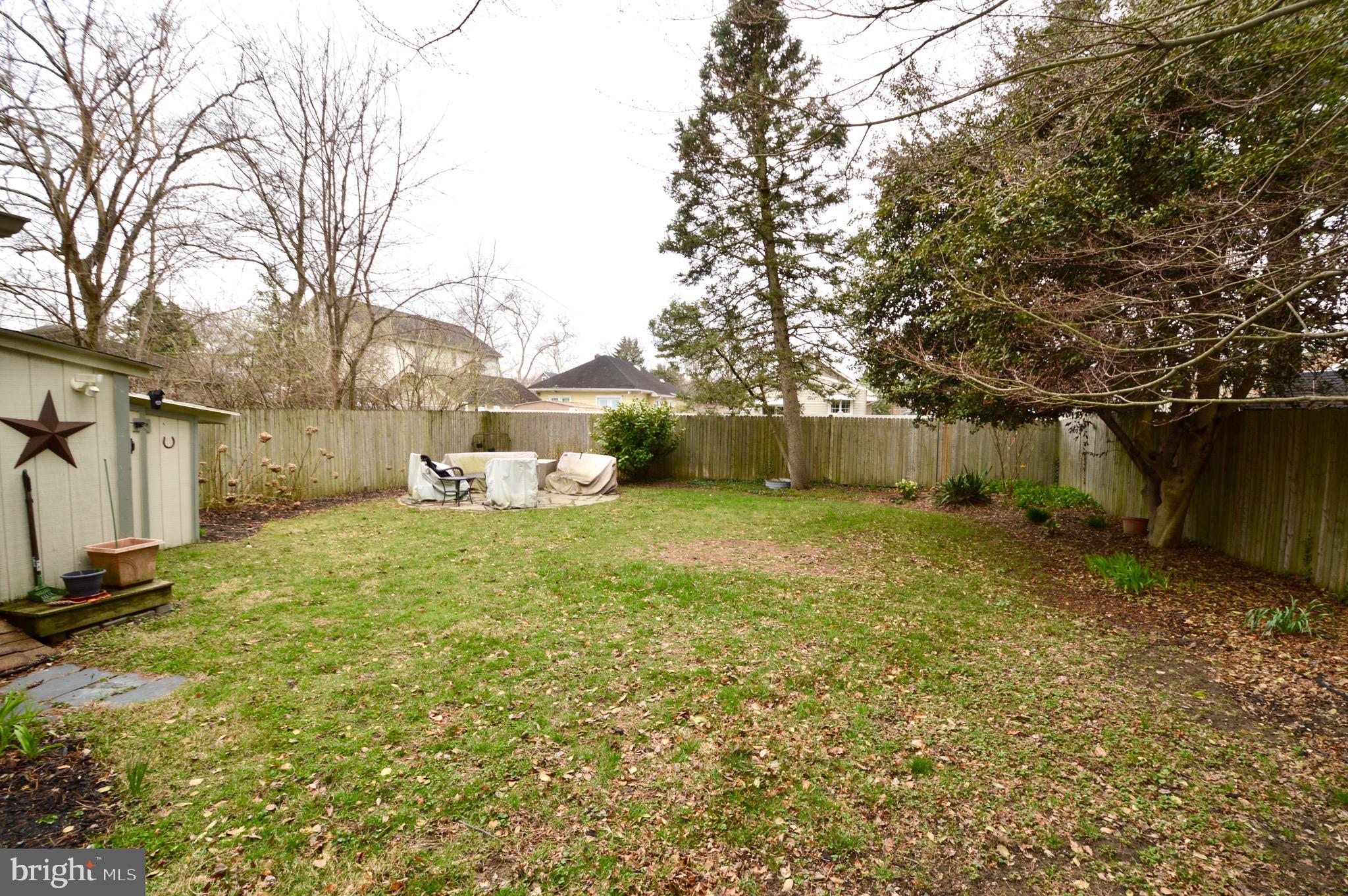 18 10th Avenue Haddon Heights, NJ 08035 - Photo 22 of 22 a backyard of a house with table and chairs