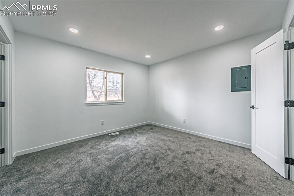 12480 Partridge Lane Peyton, CO 80831 - Photo 11 of 38 an empty room with windows