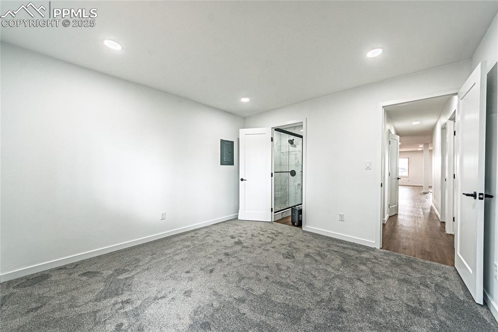 12480 Partridge Lane Peyton, CO 80831 - Photo 12 of 38 an empty room with closet and wooden floor