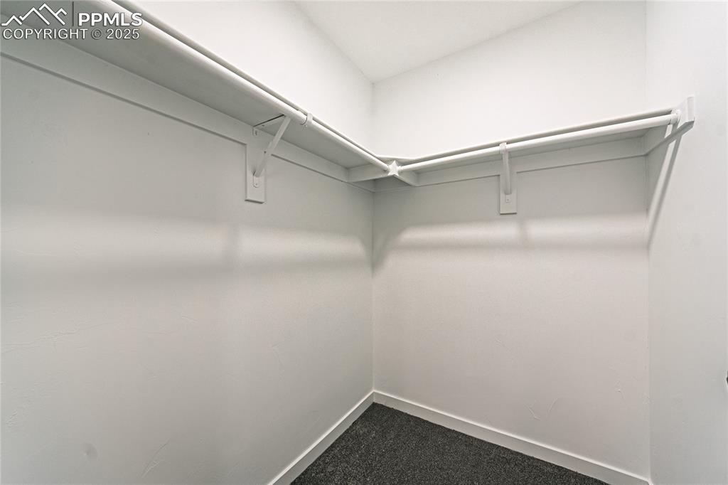 12480 Partridge Lane Peyton, CO 80831 - Photo 17 of 38 a view of a room with shelf on the wall