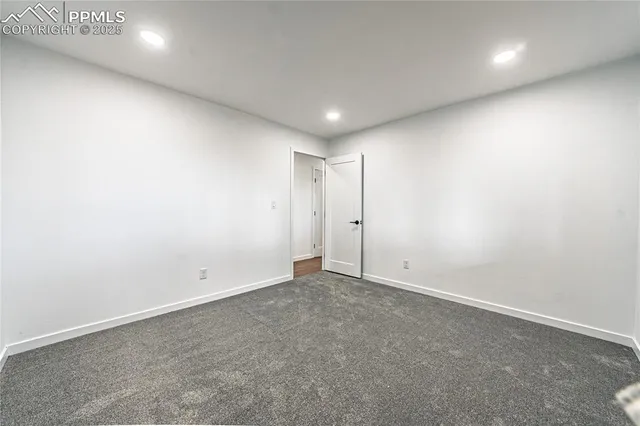 an empty room with an entryway