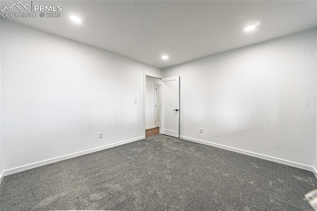 12480 Partridge Lane Peyton, CO 80831 - Photo 20 of 38 an empty room with an entryway