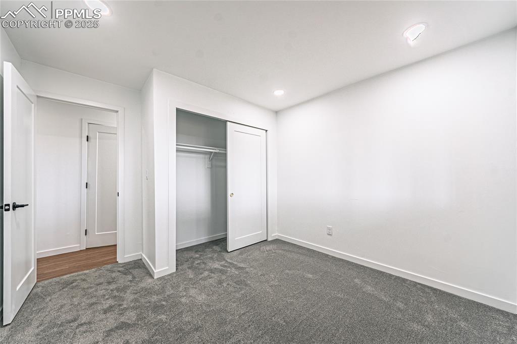 12480 Partridge Lane Peyton, CO 80831 - Photo 23 of 38 an empty room with closet area