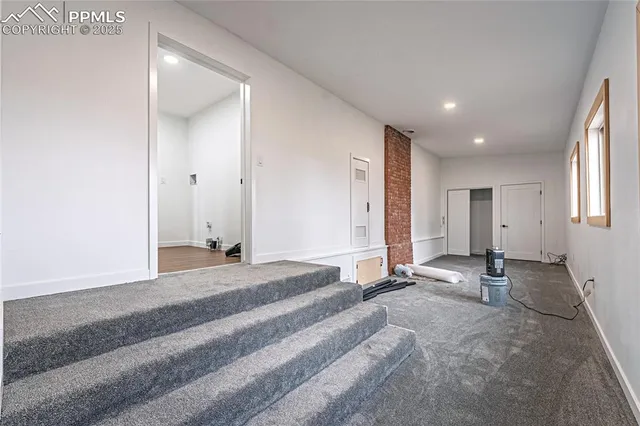 a view of a livingroom with a large window