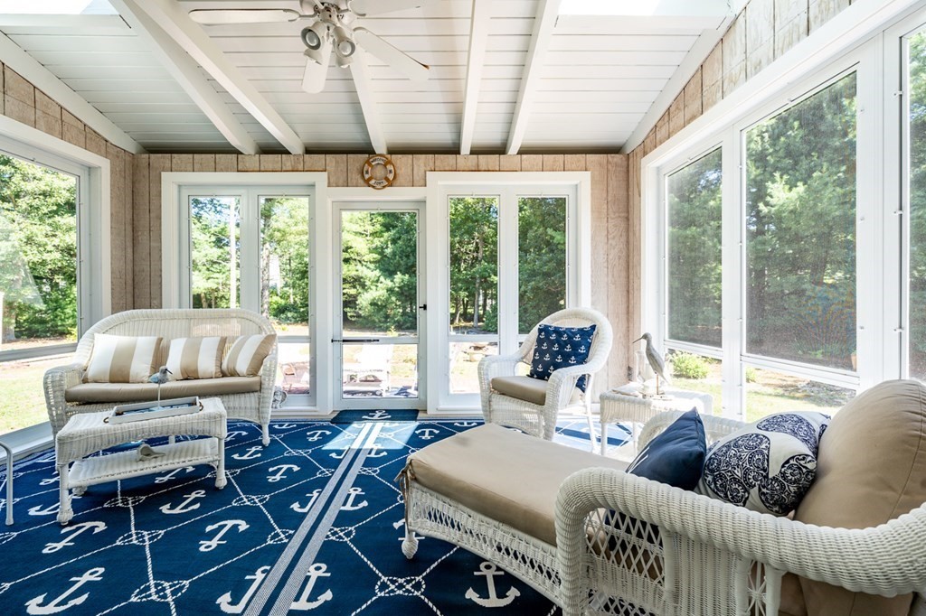 104 Cherry Tree Road Barnstable, MA 02635 - Photo 11 of 22 a living room with furniture and large windows