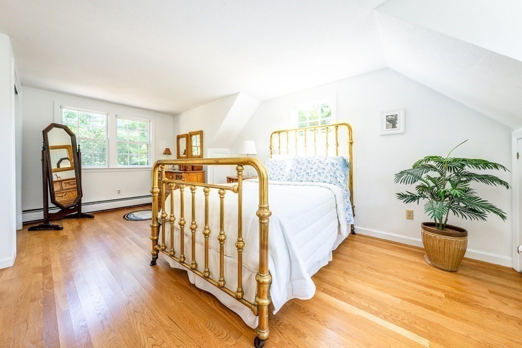 104 Cherry Tree Road Barnstable, MA 02635 - Photo 14 of 22 a living room with furniture and a potted plant