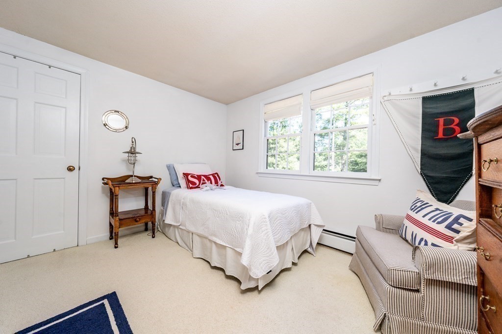 104 Cherry Tree Road Barnstable, MA 02635 - Photo 21 of 22 a bedroom with a bed and a window