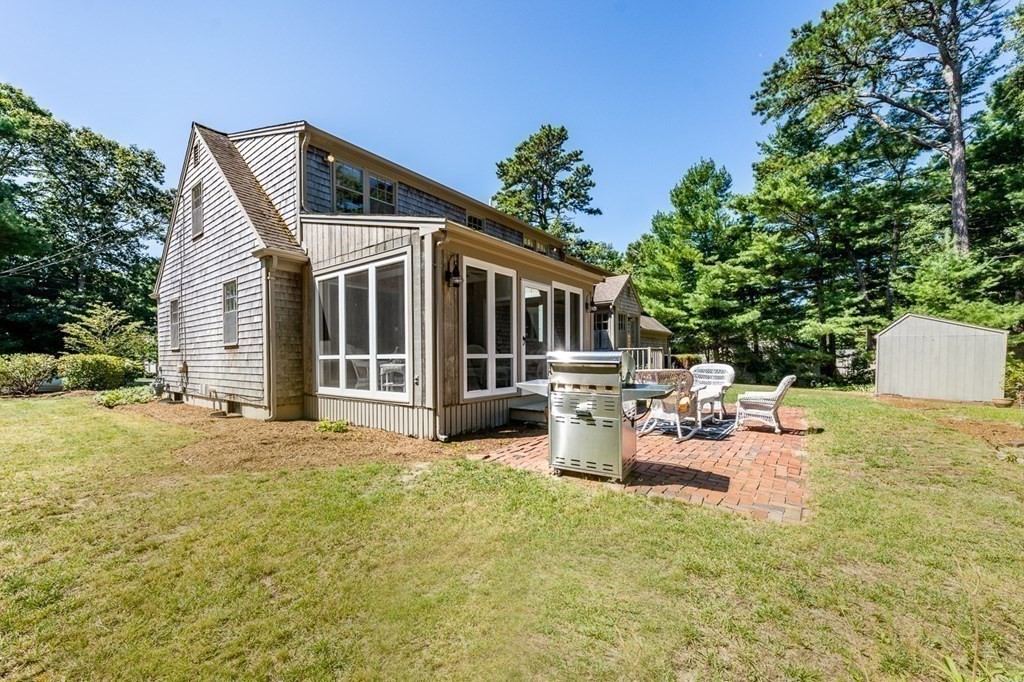 104 Cherry Tree Road Barnstable, MA 02635 - Photo 22 of 22 a view of a house with backyard and sitting area