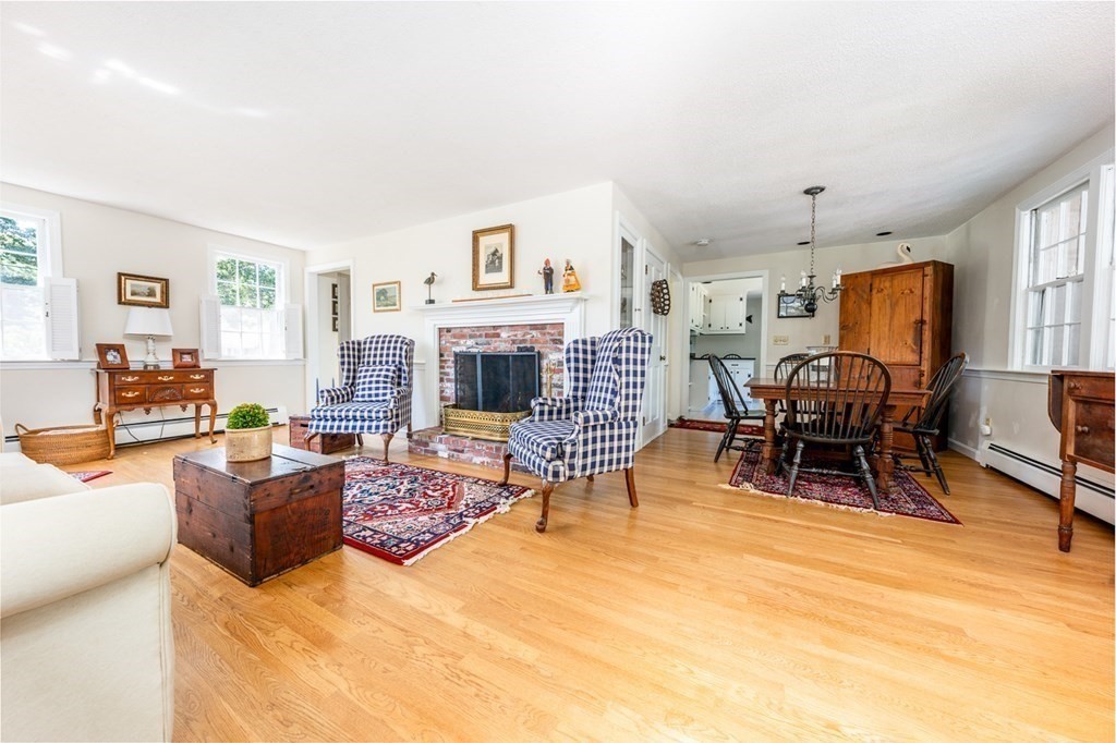 104 Cherry Tree Road Barnstable, MA 02635 - Photo 3 of 22 a living room with furniture and a fireplace