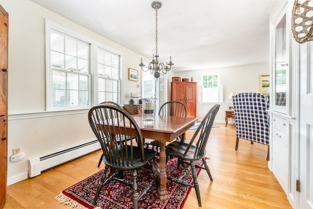 104 Cherry Tree Road Barnstable, MA 02635 - Photo 5 of 22 a view of a dining room with furniture window and wooden floor