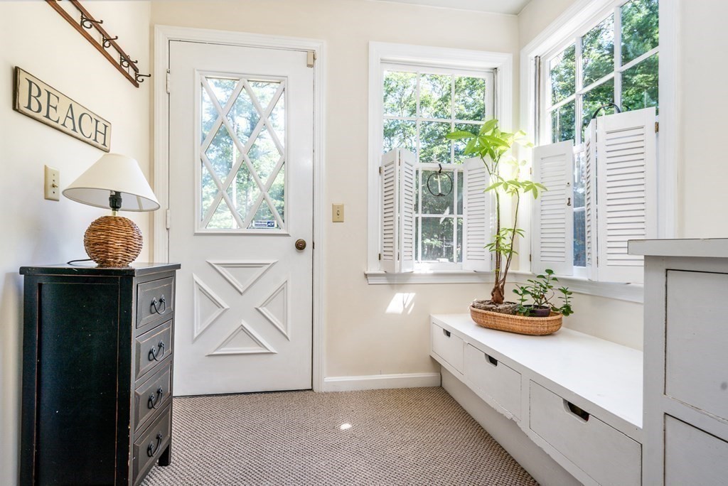 104 Cherry Tree Road Barnstable, MA 02635 - Photo 10 of 22 a kitchen with a window and cabinets