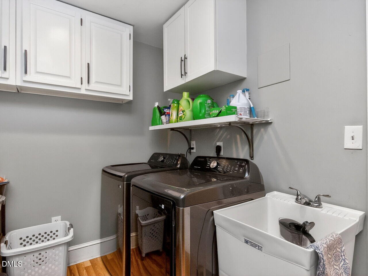 6004 Tarnhour Court Raleigh, NC 27612 - Photo 16 of 44 a utility room with sink dryer and washer
