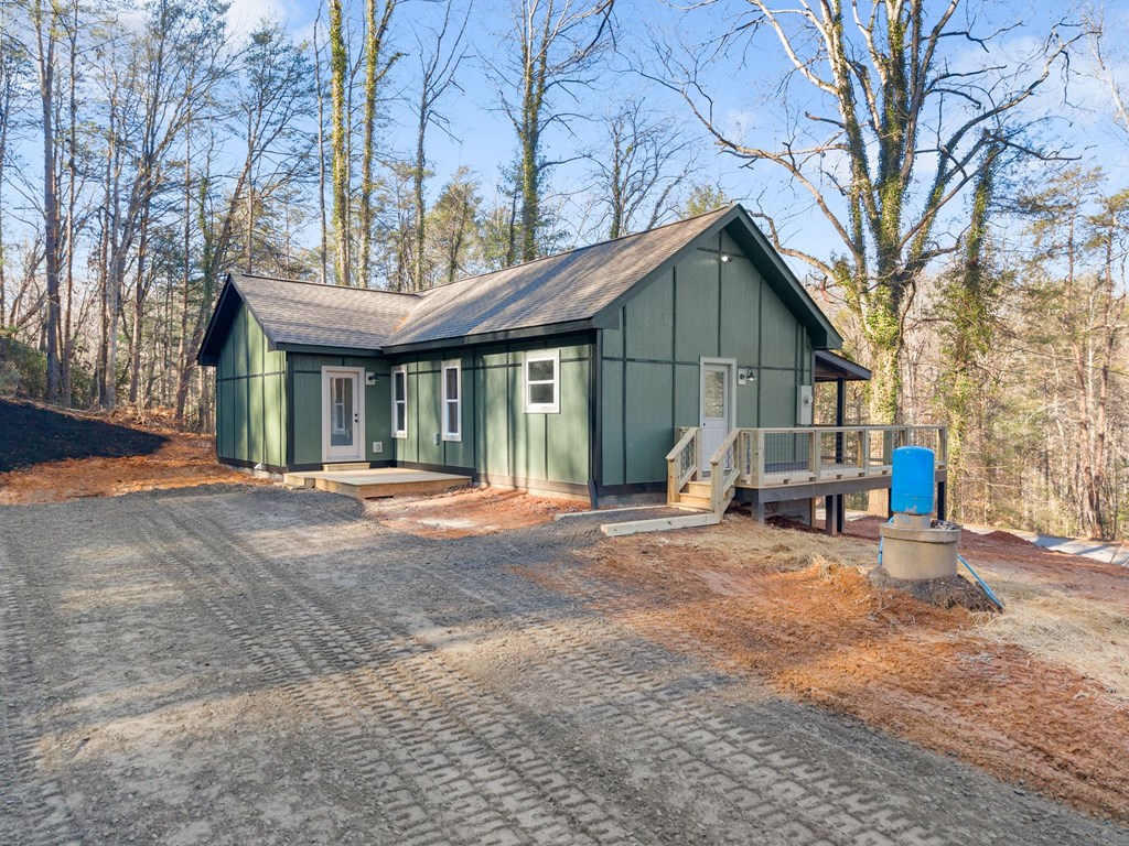 1410 Sky Lake Road Sautee Nacoochee, GA 30571 - Photo 13 of 37 a view of a house with a yard and large tree