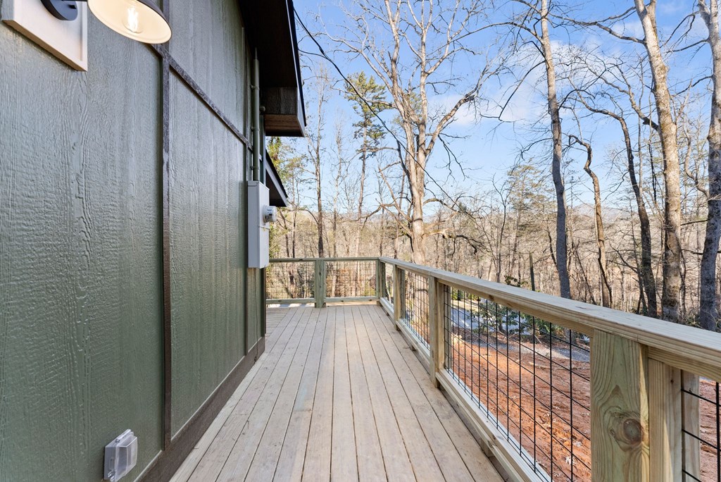 1410 Sky Lake Road Sautee Nacoochee, GA 30571 - Photo 14 of 37 a view of balcony with wooden floor and fence