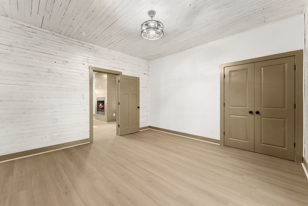 1410 Sky Lake Road Sautee Nacoochee, GA 30571 - Photo 17 of 37 a view of an empty room with closet and a window