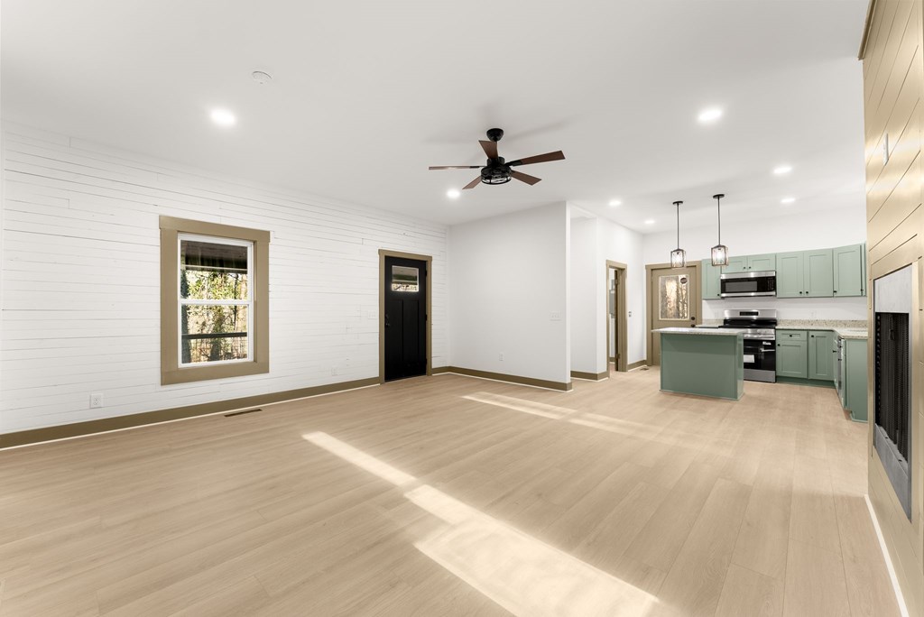 1410 Sky Lake Road Sautee Nacoochee, GA 30571 - Photo 34 of 37 a large kitchen with stainless steel appliances kitchen island a large counter top and oven