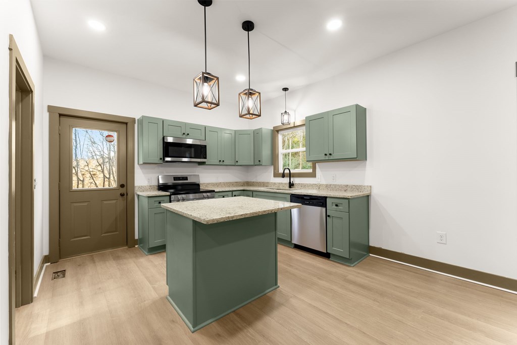 1410 Sky Lake Road Sautee Nacoochee, GA 30571 - Photo 35 of 37 a kitchen with a sink stove and microwave