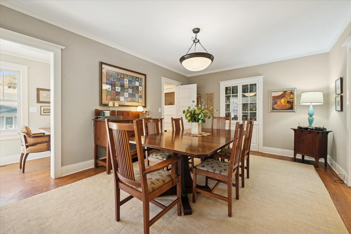 1570 Ashland Avenue Evanston, IL 60201 - Photo 13 of 40 a view of a dining room with furniture and wooden floor