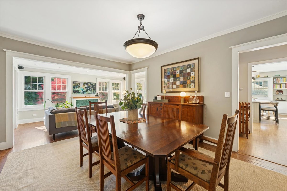 1570 Ashland Avenue Evanston, IL 60201 - Photo 14 of 40 a view of a dining room with furniture and wooden floor