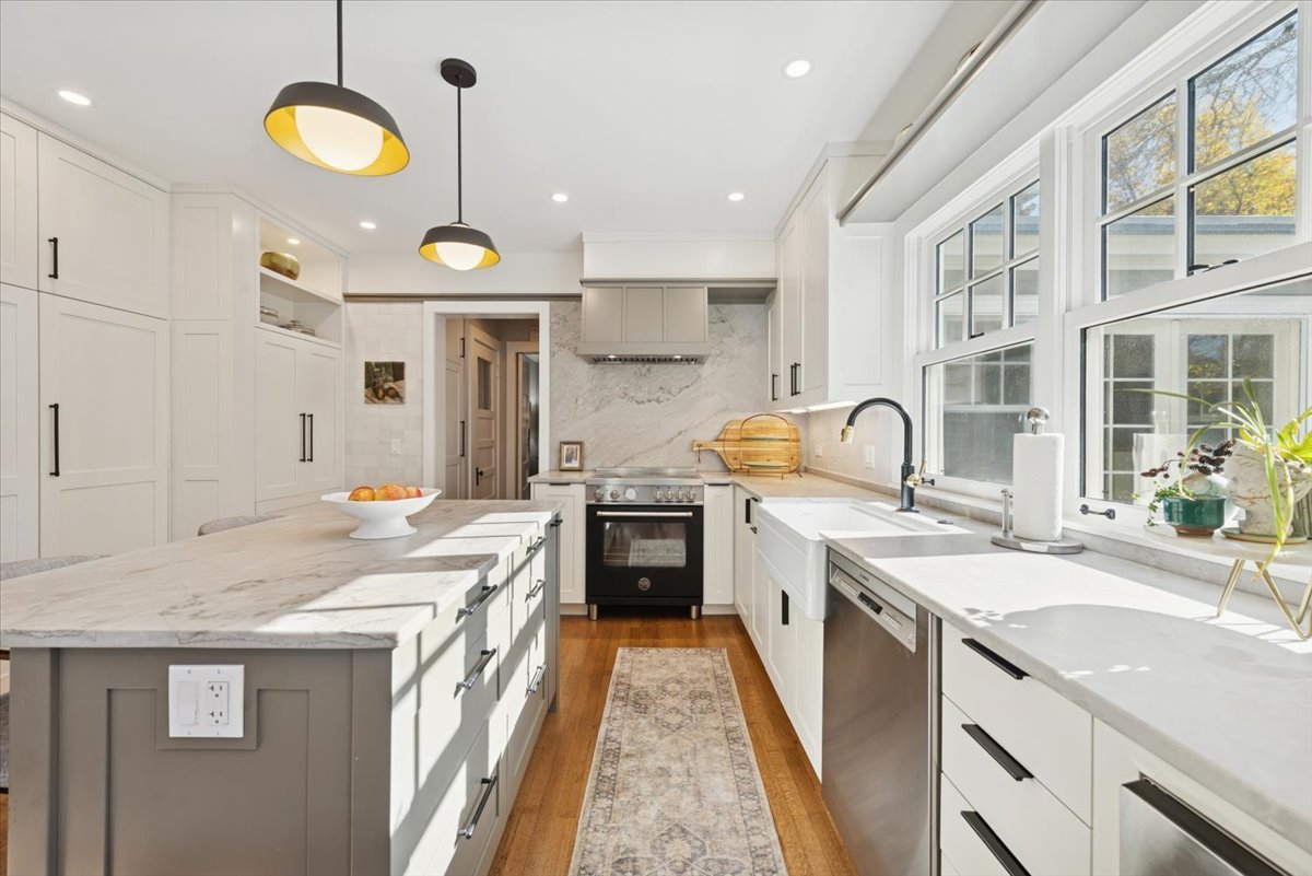 1570 Ashland Avenue Evanston, IL 60201 - Photo 18 of 40 a kitchen with a stove a sink and a refrigerator