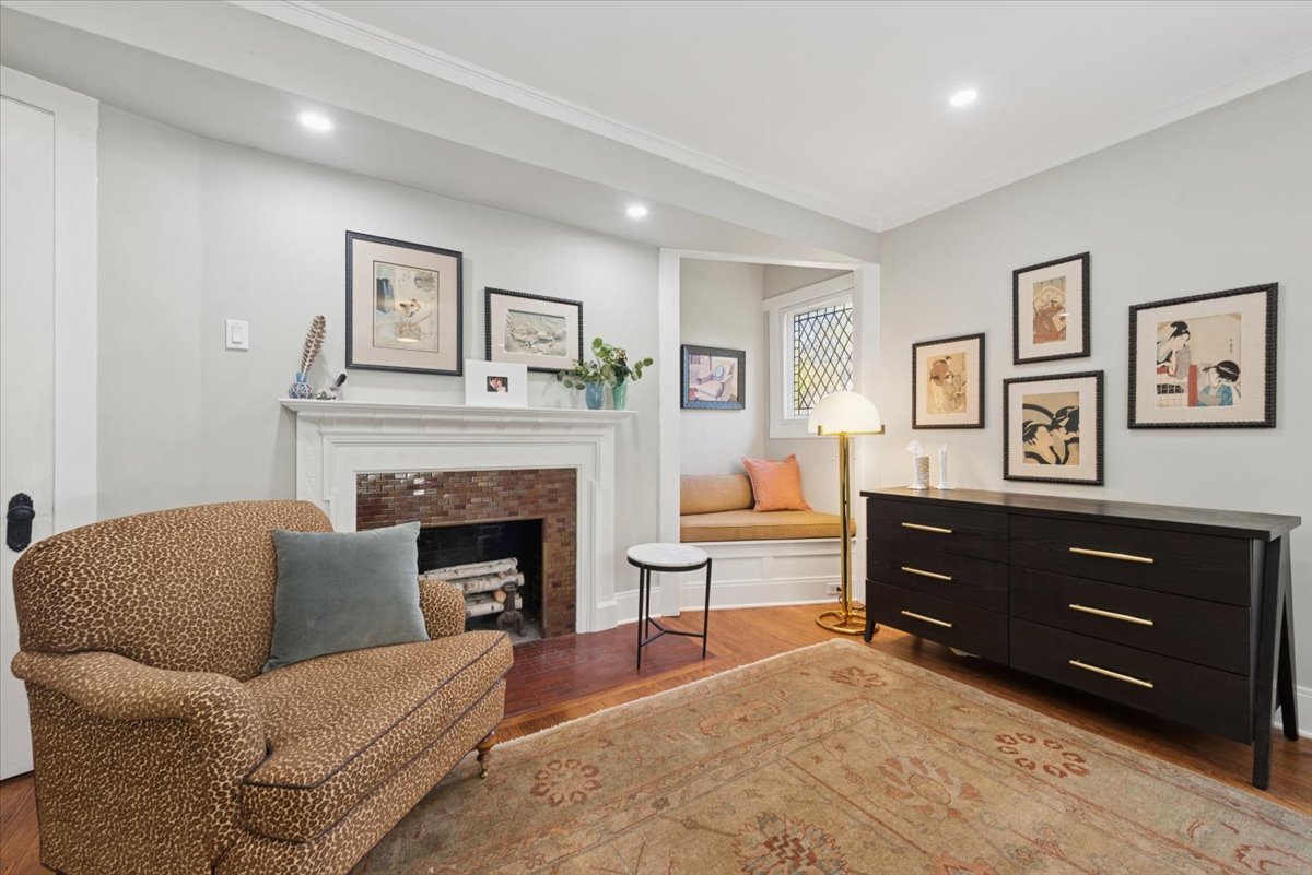 1570 Ashland Avenue Evanston, IL 60201 - Photo 28 of 40 a living room with furniture and a fireplace