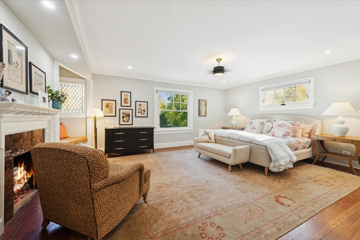 1570 Ashland Avenue Evanston, IL 60201 - Photo 29 of 40 a spacious bedroom with a bed a couch and dresser
