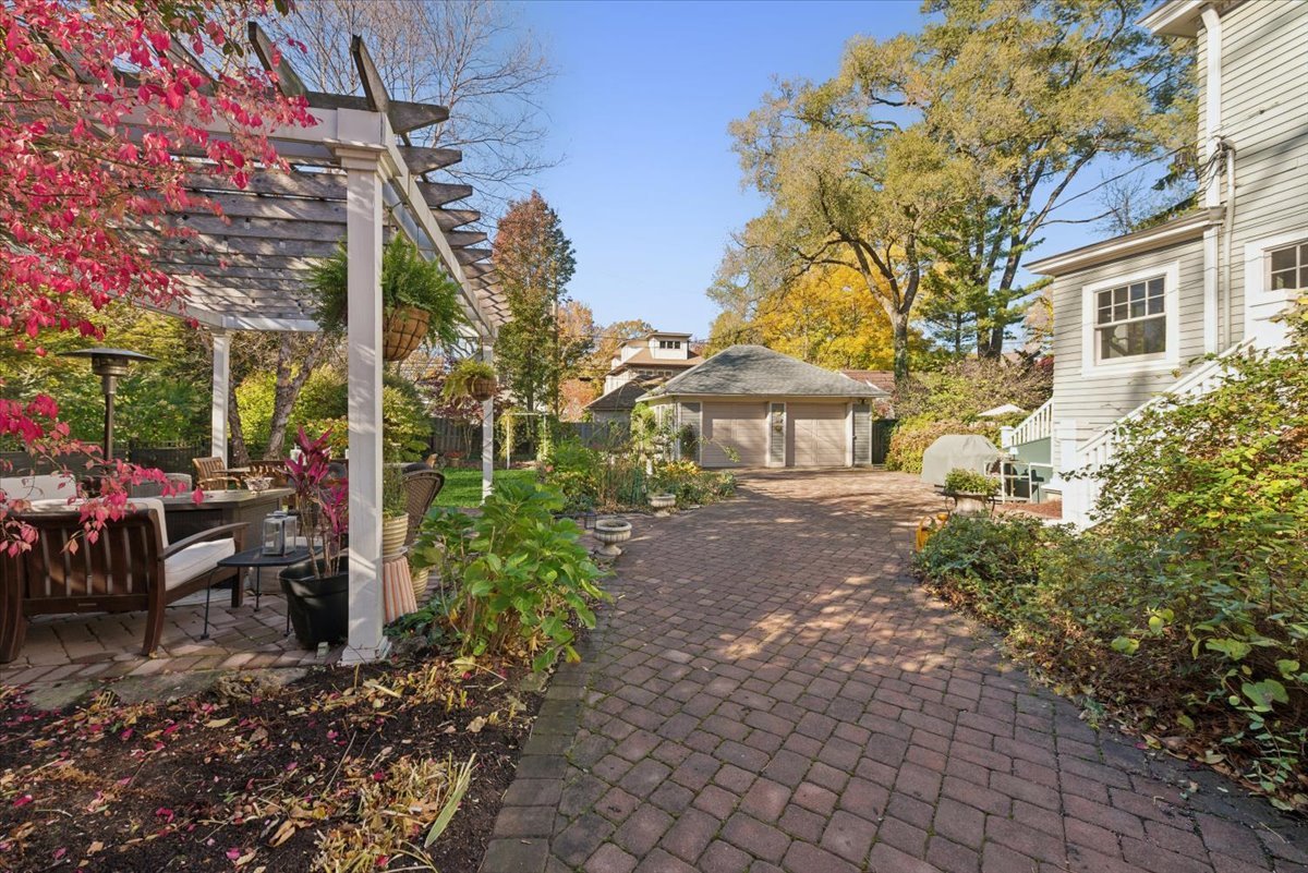 1570 Ashland Avenue Evanston, IL 60201 - Photo 3 of 40 a front view of a house with a yard and sitting area