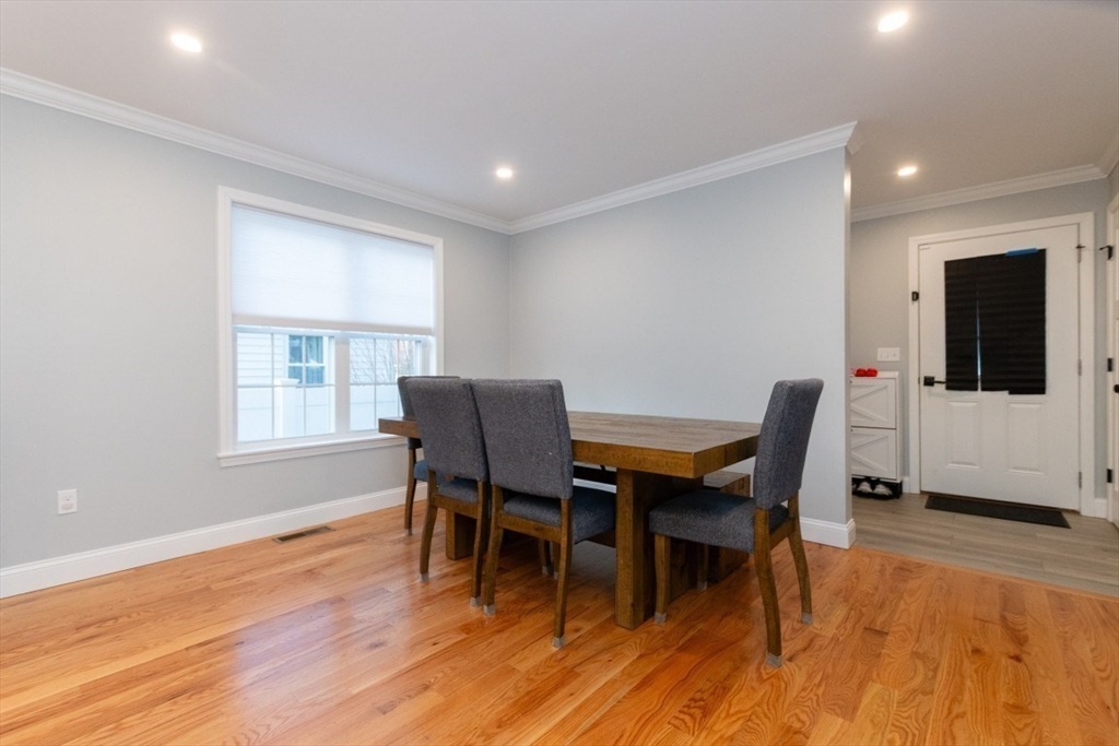 21 Juniper Road Norton, MA 02766 - Photo 13 of 33 a view of a dining room with furniture and wooden floor