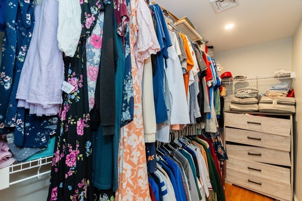 21 Juniper Road Norton, MA 02766 - Photo 22 of 33 a view of walk in closet with clothes