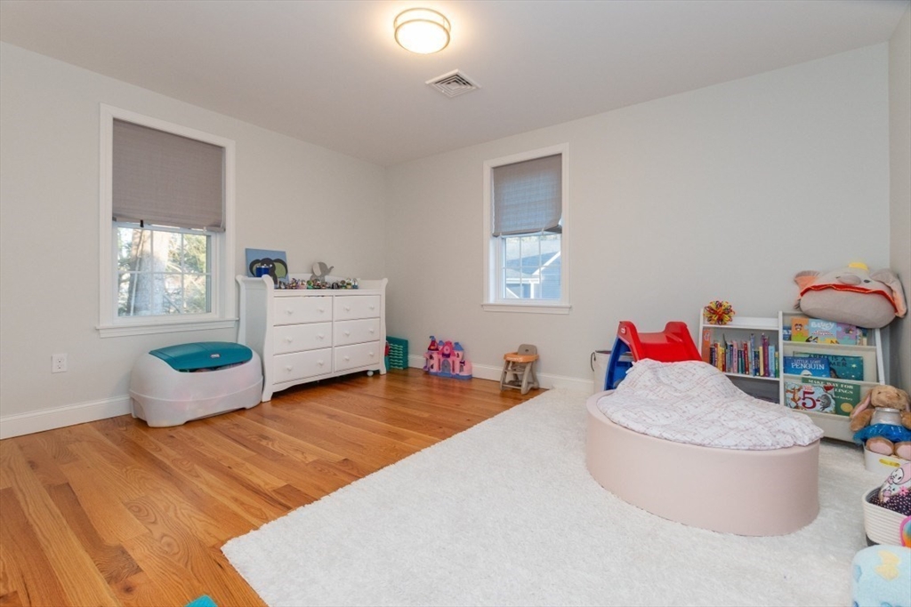 21 Juniper Road Norton, MA 02766 - Photo 24 of 33 a living room with furniture and a wooden floor