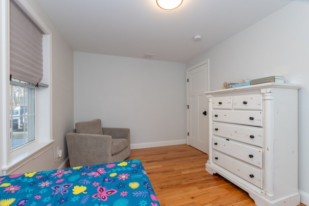 21 Juniper Road Norton, MA 02766 - Photo 28 of 33 a room with baby crib and dresser