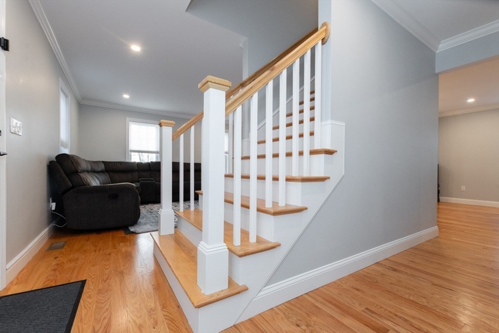 21 Juniper Road Norton, MA 02766 - Photo 3 of 33 a view of entryway with wooden floor