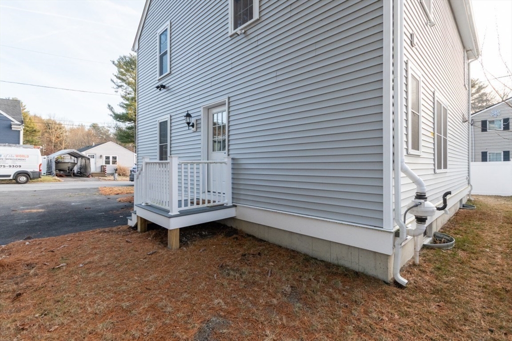 21 Juniper Road Norton, MA 02766 - Photo 31 of 33 a view of backyard with barbeque grill wooden floor and fence