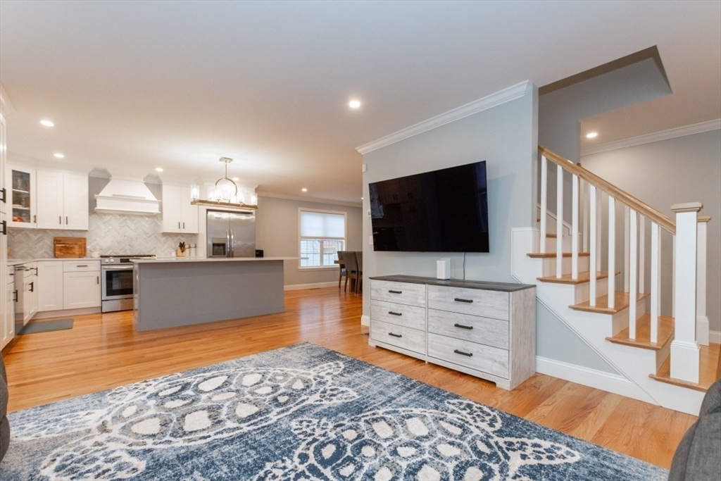 21 Juniper Road Norton, MA 02766 - Photo 6 of 33 a living room with furniture and a flat screen tv