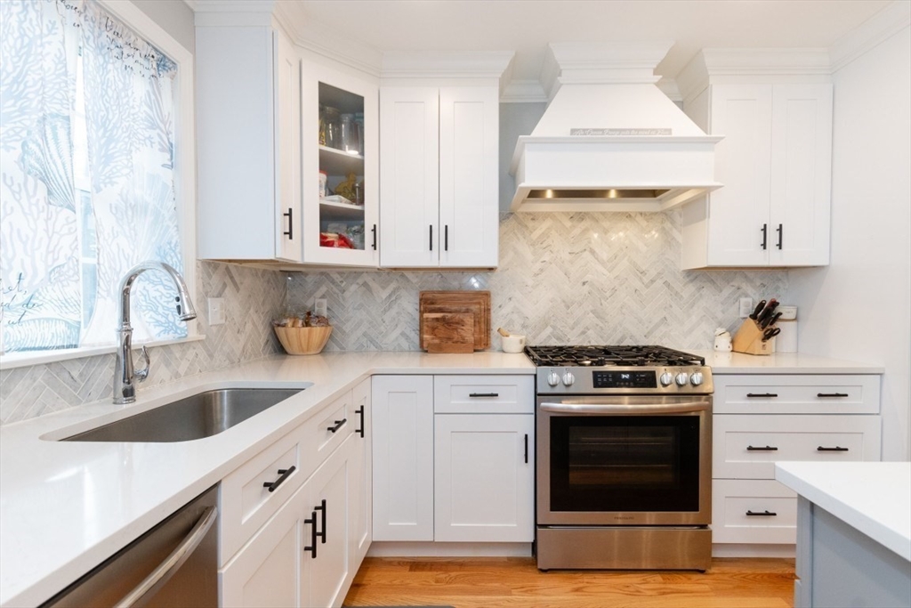21 Juniper Road Norton, MA 02766 - Photo 10 of 33 a kitchen with cabinets appliances and a sink
