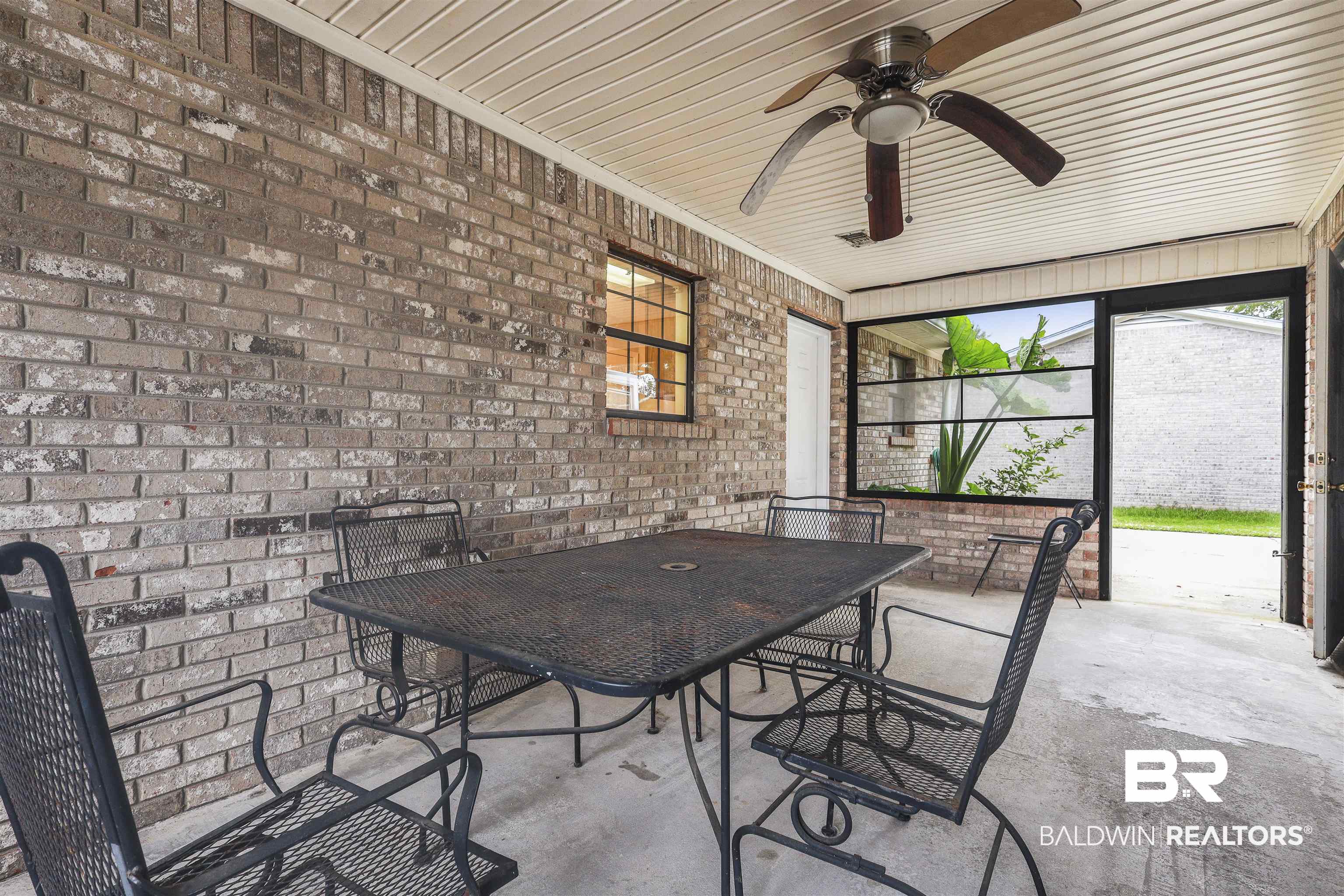 507 West Amanda Avenue Foley, AL 36535 - Photo 20 of 23 Unfurnished sunroom with ceiling fan