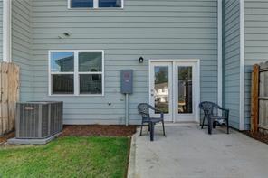 102 Ellicott Way Cartersville, GA 30120 - Photo 2 of 3 a backyard of a house with outdoor seating