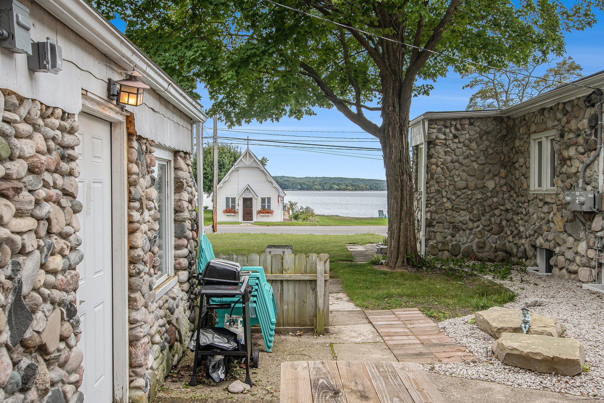 4642 Main Street Onekama, MI 49675 - Photo 27 of 61 Lake view from the Yard