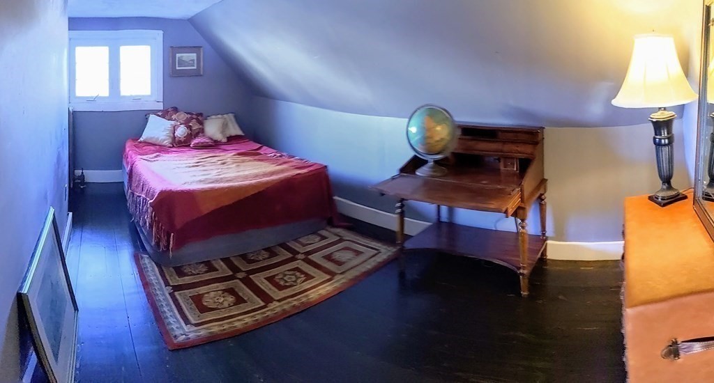 74 Sydney Street, Unit 2 Boston, MA 02125 - Photo 15 of 28 a living room with hard wood floors and a table