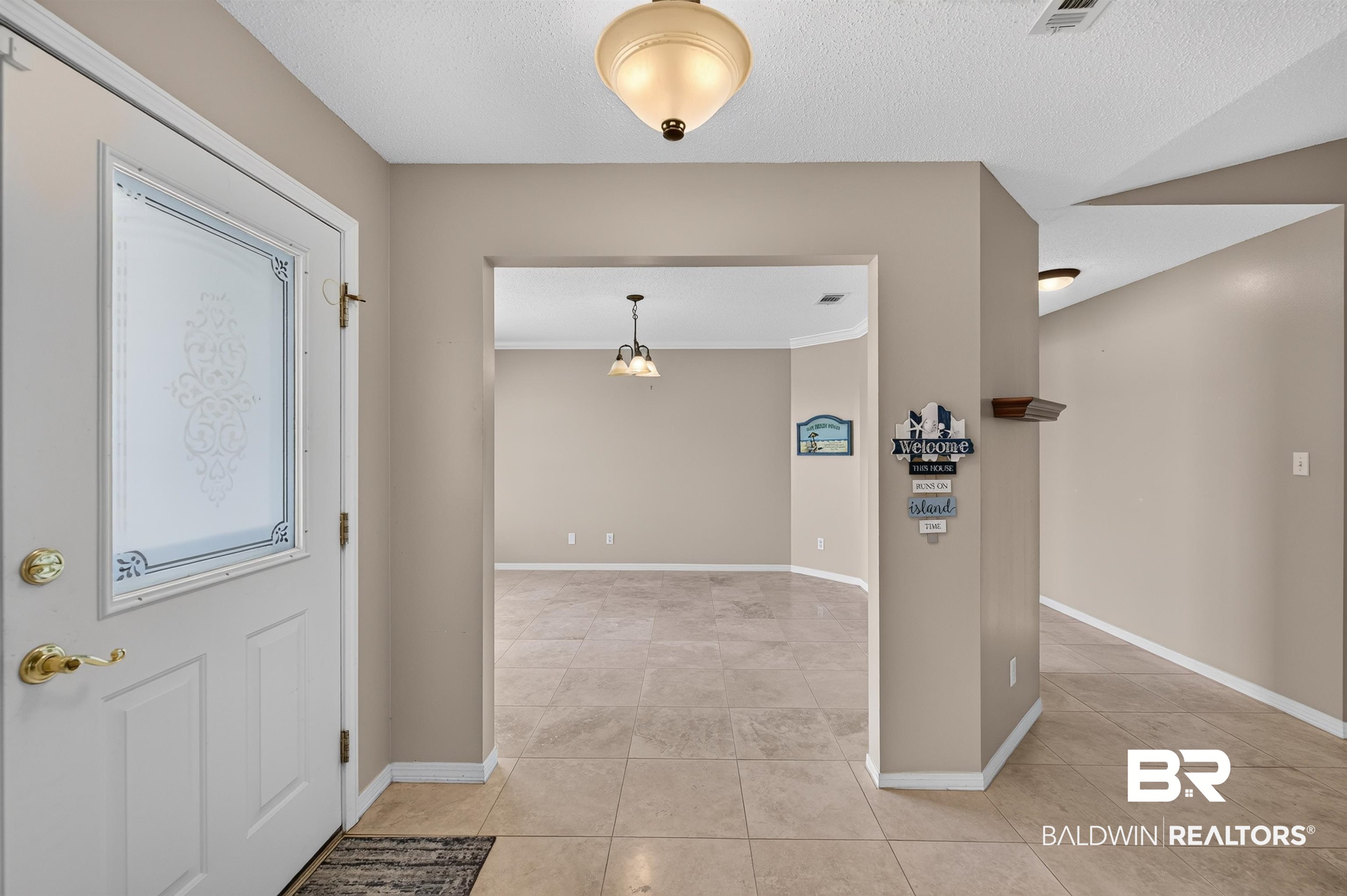 22685 County Road 12 Foley, AL 36535 - Photo 20 of 89 Entryway featuring a decorative frosted glass door, tile flooring, and a semi-flush mount ceiling light