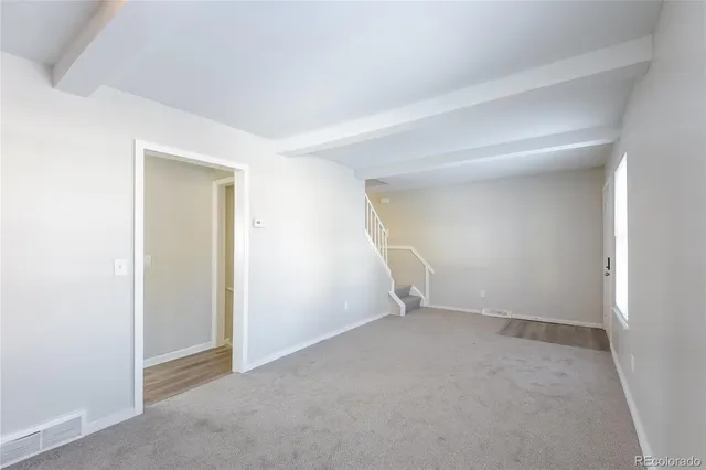 an empty room with a natural light