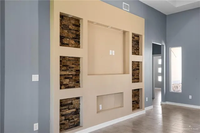 a view of livingroom with wooden floor