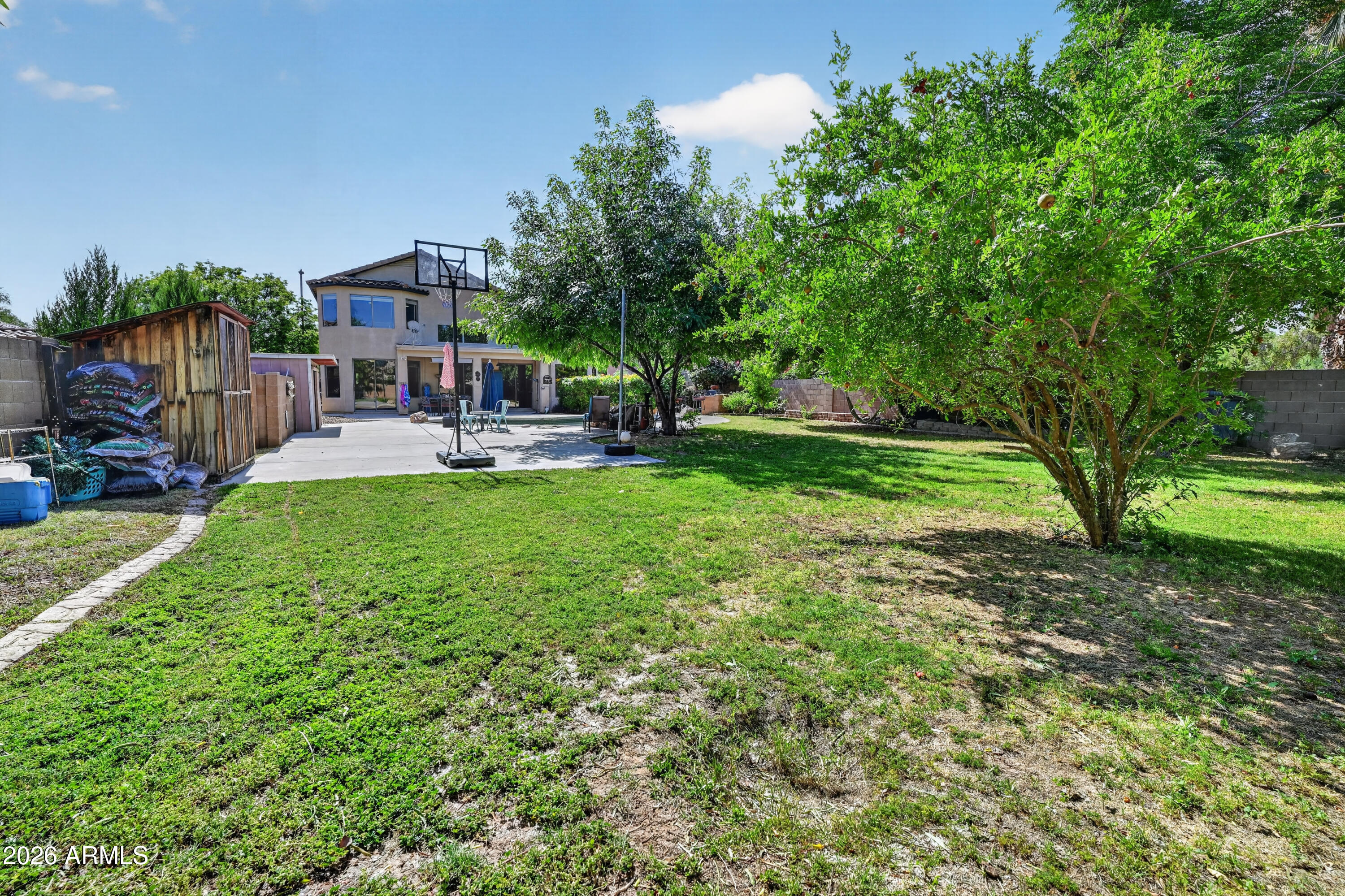 1414 South Sandstone Street Gilbert, AZ 85296 - Photo 13 of 43 a view of a house with a yard porch and sitting area