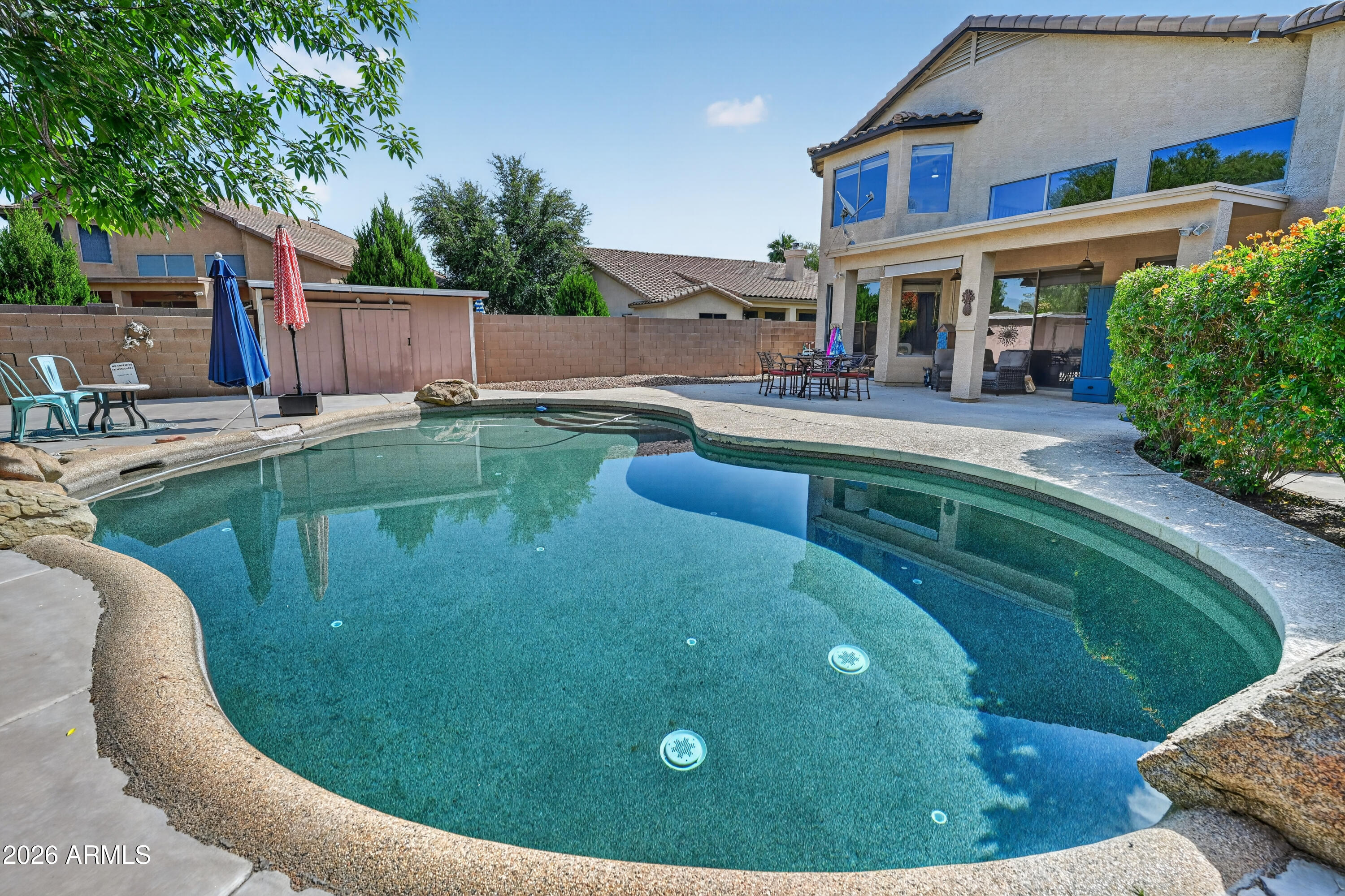 1414 South Sandstone Street Gilbert, AZ 85296 - Photo 16 of 43 a view of a house with swimming pool