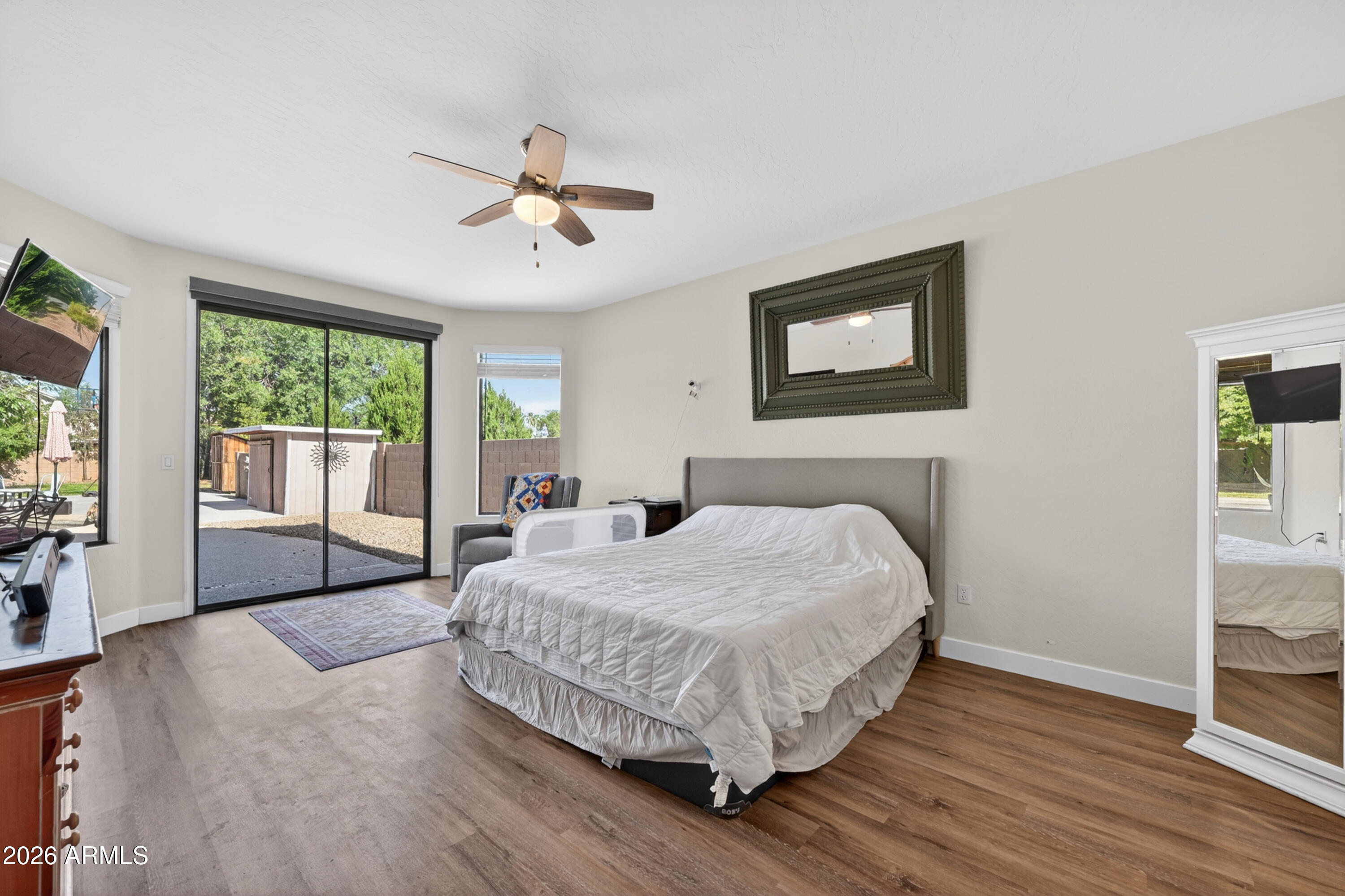 1414 South Sandstone Street Gilbert, AZ 85296 - Photo 18 of 43 a bedroom with a bed and a large window