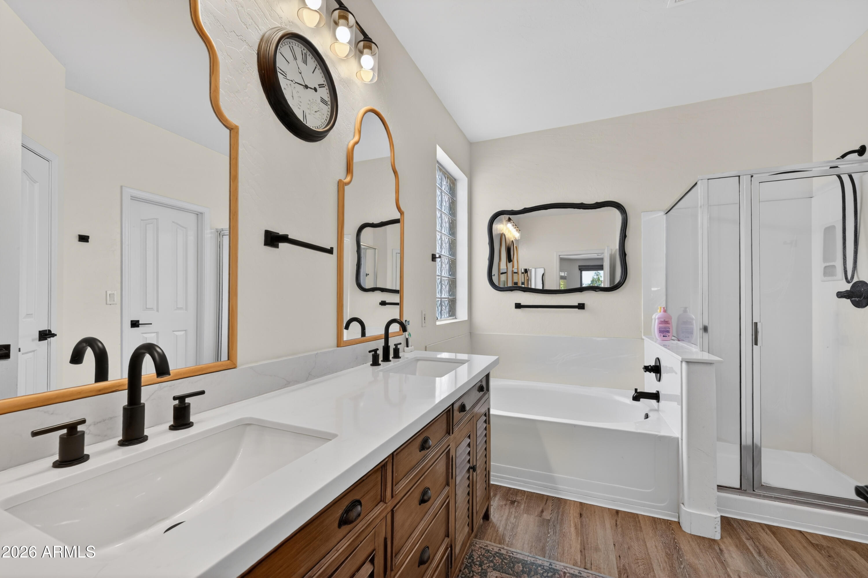 1414 South Sandstone Street Gilbert, AZ 85296 - Photo 20 of 43 a bathroom with a tub sink and mirror