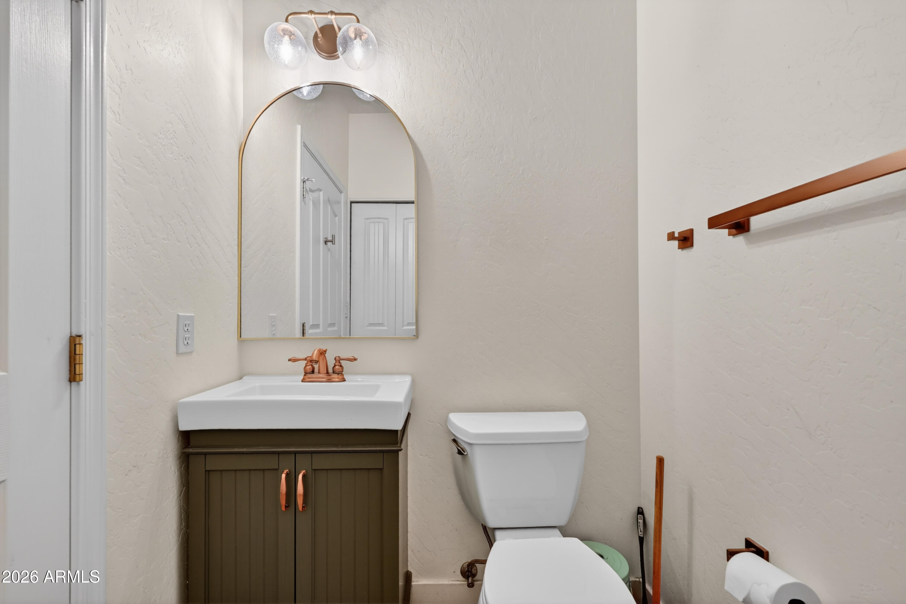 1414 South Sandstone Street Gilbert, AZ 85296 - Photo 23 of 43 a bathroom with a sink and a toilet