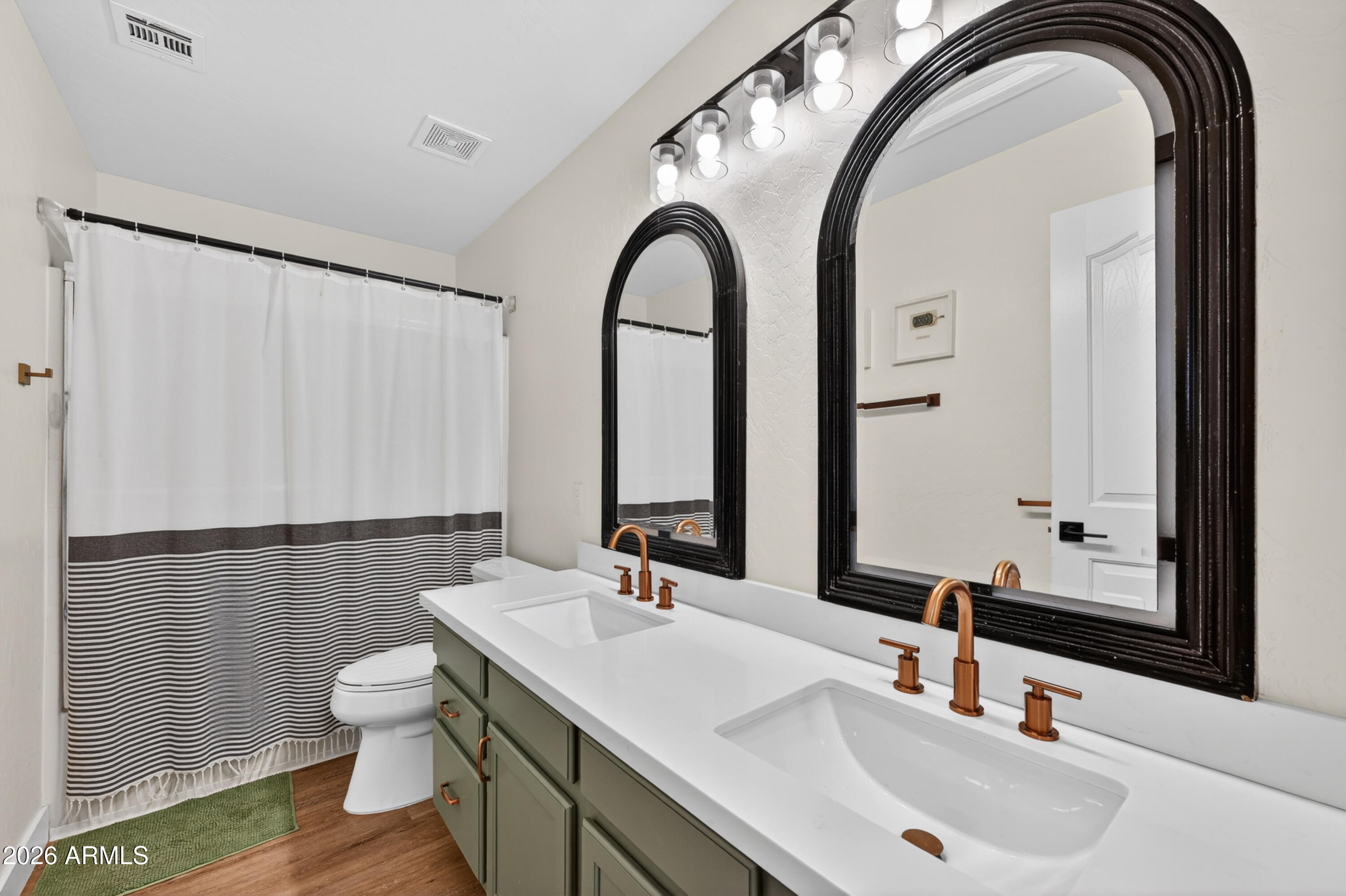 1414 South Sandstone Street Gilbert, AZ 85296 - Photo 27 of 43 a bathroom with a sink and a mirror